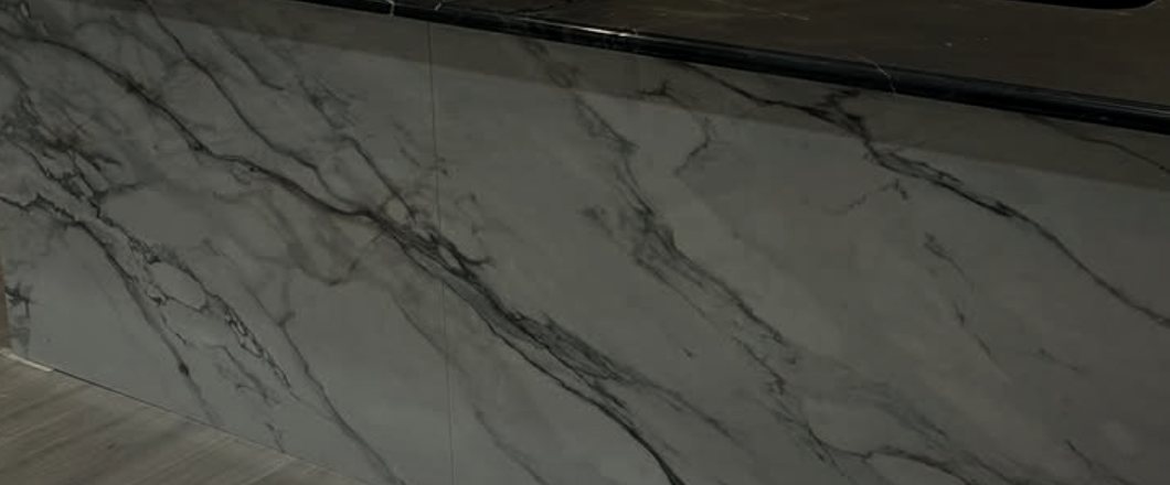 Porcelain slab with grey marble veining